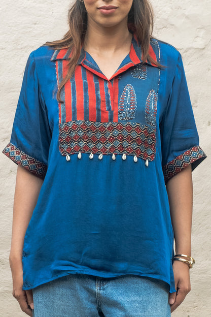 Neel Top